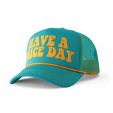 Teal cap with 'Have a Nice Day' text in yellow on a white background