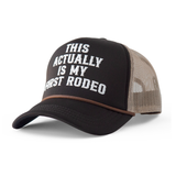 Brown and beige cap with text 'This Actually Is My First Rodeo' in puff print