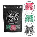 Packaging for SWAG Island Life 3-Pack Boxers showing three pairs of boxer briefs with Hawaiian flower patterns in red, green, and black colors, displayed in a black zip pouch.